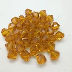 スワロフスキー　5301　8mm 　トパーズ　ソロバン形　40個