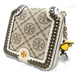 TORY BURCH ラウンドファスナー 編み込み 二つ折り財布 花チャームのサムネイル