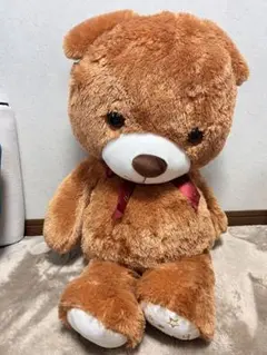 茶色のリボン付き大きめぬいぐるみ