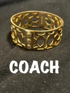 COACH コーチ ワイド バングル シグネチャー ゴールド オープンワーク 金