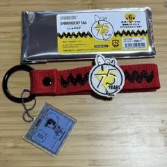 スヌーピー刺繍タグ 75周年 初登場コミックアクリルマスコット付き