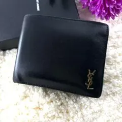 美品✨サンローラン 二つ折り財布 レザー カサンドラ 金具 ロゴ 黒小銭入れのサムネイル