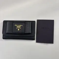 ⚠︎みあちゃん⚠︎ PRADA キーケース ブラック リボン ⚠︎みあちゃん様専用⚠︎ PRADA キーケース ブラック リボン - メルカリ
