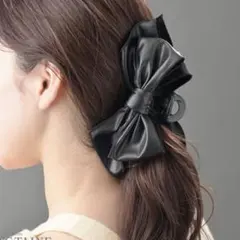 ヴァンテーヌ　黒 合成皮革 リボン型ヘアクリップ