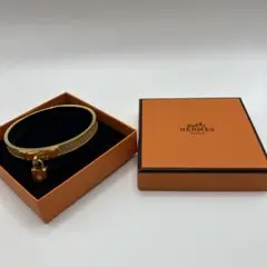 HERMES ゴールド バングル ロック付きのサムネイル