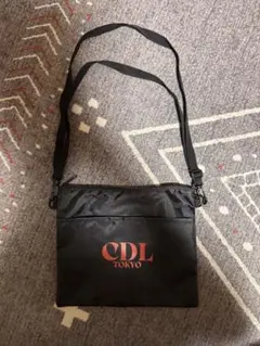 CDL TOKYO ノベルティサコッシュ ØMI