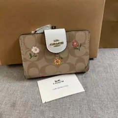 COACH 二つ折り財布 花柄 ベージュ