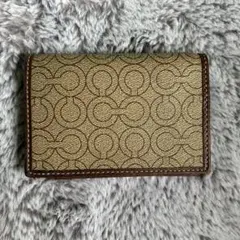 COACH 二つ折りカードケース シグネチャー オプアート ブラウン