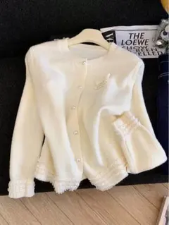 ホワイトニットカーディガン フリル付き