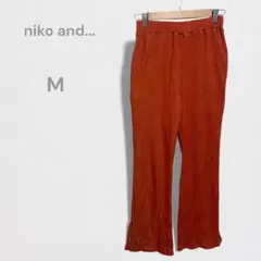 ニコアンド ストライプリブフレアパンツ スリット ウエストゴム オレンジ M