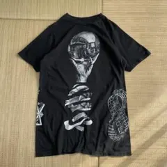 オフィシャル エッシャー マルチプリント MCE Tシャツ ブラック S