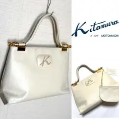Kitamura キタムラ フロント エンブレム デザイン レザー ハンドバッグ