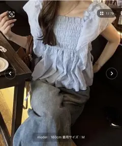 nelliy. フリルシャーリングシアーブラウス