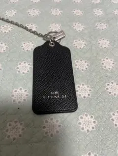 【値下げ】【COACH】キーホルダー ブラック 星のサムネイル