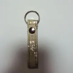 オーストキーホルダー　ベージュラメ入