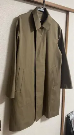 カーキ ステンカラーコート 前面ポケット付き