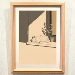 窓辺で眠る猫