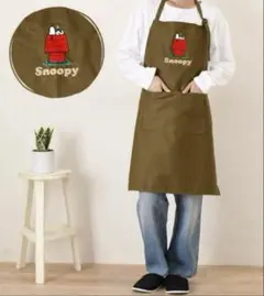 新品 75周年のスヌーピーの刺繍が施されたエプロン！