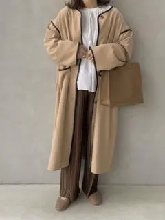 ノーカラーパイピングトレンチコート