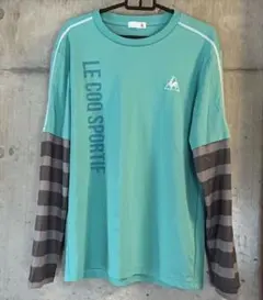 ルコックスポルティフロンT 長袖Tシャツ水色トレーニングウェア メンズ