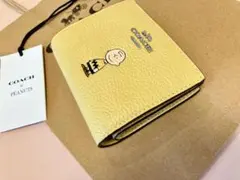 新品【COACH X PEANUTS】スナップ ウォレット チャーリー ブラウン
