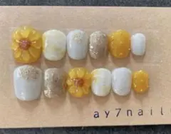 ひまわりぷっくりフラワーネイル　向日葵ネイル　ガーリー　夏ネイル　ベリーショート