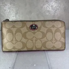 COACH コーチ シグネチャー ラウンドファスナー長財布 ベージュ×ピンク