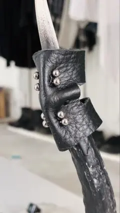 crossdrape piercing leather armerring