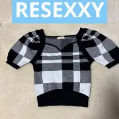 RESEXXY チェック柄パフスリーブニット ハートネックラグラントップス