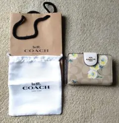 COACH 花柄 二つ折り財布