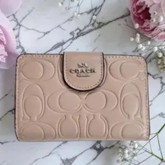 COACH 二つ折り財布 ピンク シグネチャー 並行輸入品:アウトレット品