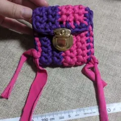ハンドメイド 編み込みポーチ パープル ピンク　ぷっくりポーチ　ティシャツヤーンのサムネイル