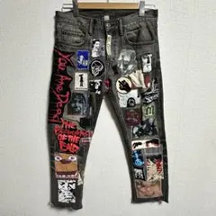 美品】ロエベ グラフィティデニムパンツ 総柄 ロゴ刻印ボタン レザー