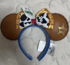 香港ディズニー 牛柄 星型バッジ付ジェシー ウッティー カチューシャ