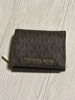 MICHAEL KORS 型押し二つ折り財布 ブラウン