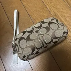 COACH シグネチャー ポーチ ミニバッグ　ホワイト　ブラウンのサムネイル