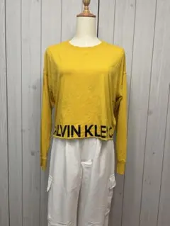 Calvin Klein イエロー 長袖クロップド丈Tシャツ