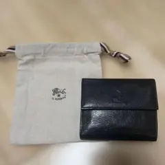 イルビゾンテ　IL BISONTE 黒 レザー 二つ折り財布 ボタン式のサムネイル