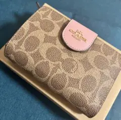COACH 二つ折り財布 シグネチャー ピンクのサムネイル