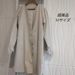 本日お値下げ！ベージュ ボタン付き トレンチコートのサムネイル