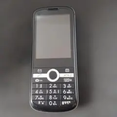 Feature phone, black, junk item.