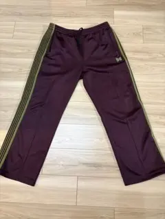 2026年最新】needles トラックパンツ マルーンの人気アイテム - メルカリ