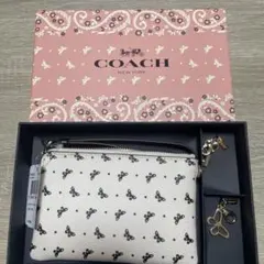 COACH 蝶々プリント レザーポーチ