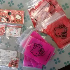 一部14枚使用.残り新品。ハローキティ ポーチセット 2色赤9枚、ピンク7枚
