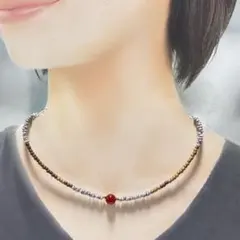 46.シンプルな茶色と中央に赤の天然石をネックレス