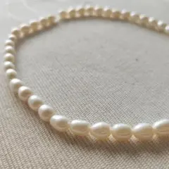 P565-4ミルキーホワイト淡水パールビーズ オーバル/ドロップ型 約6-7mm