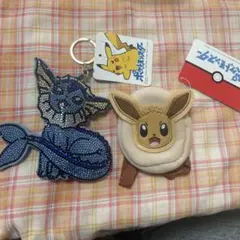 イーブイ　ミニリュックポーチ　シャワーズ　キラキラキーホルダー　ポケモン