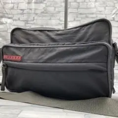 プラダスポーツ カメラバッグ 斜め掛け アーカイブ グレー 4VA122