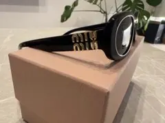 MIU MIU ミュウミュウ グリンプス サングラス SMU06Z - メルカリ