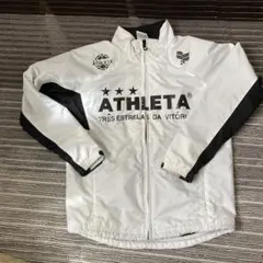 ATHLETA ピステ・ウィンドブレーカー ホワイト/ブラック　140